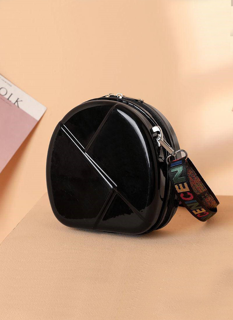 16 Bolsa de mano, Black Hardshell Round bag w/ colorful strap. - Image 1